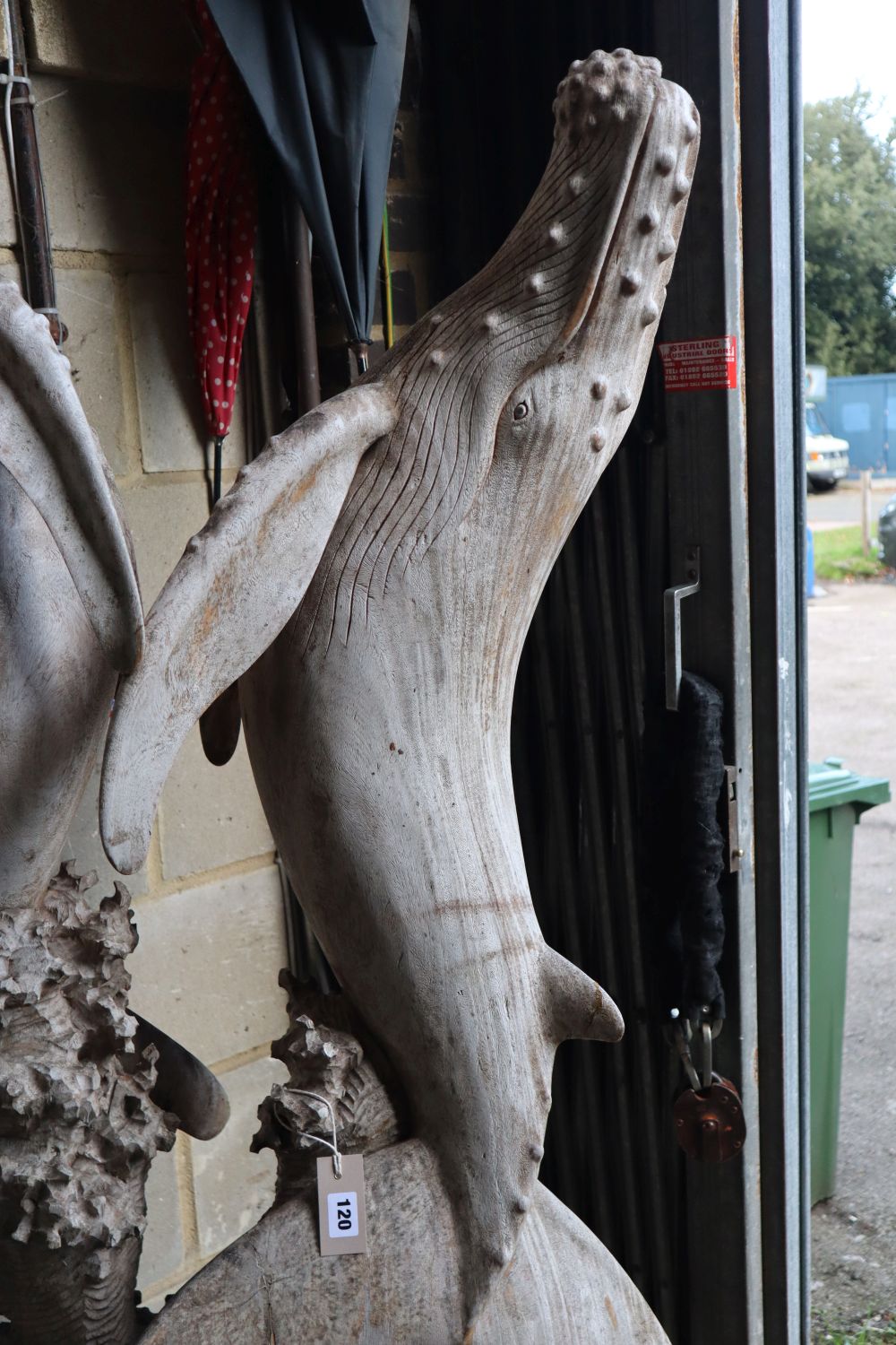 A large carved hardwood sculpture of whales, height 202cm